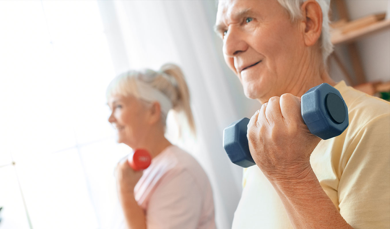 Senior Couple Working Out Together at Home