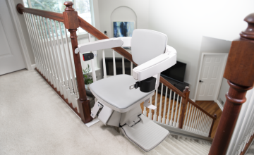 Bruno Elan 5000 stairlift with swivel seat at the top of the stairs