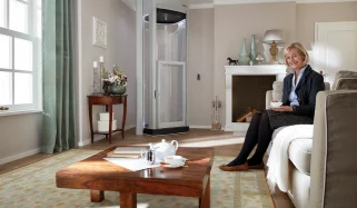 Home-Elevator-Duo-Alta-Senior-Woman-Living-Room