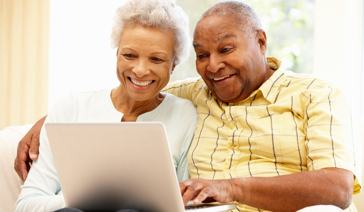 Senior African American couple using computer